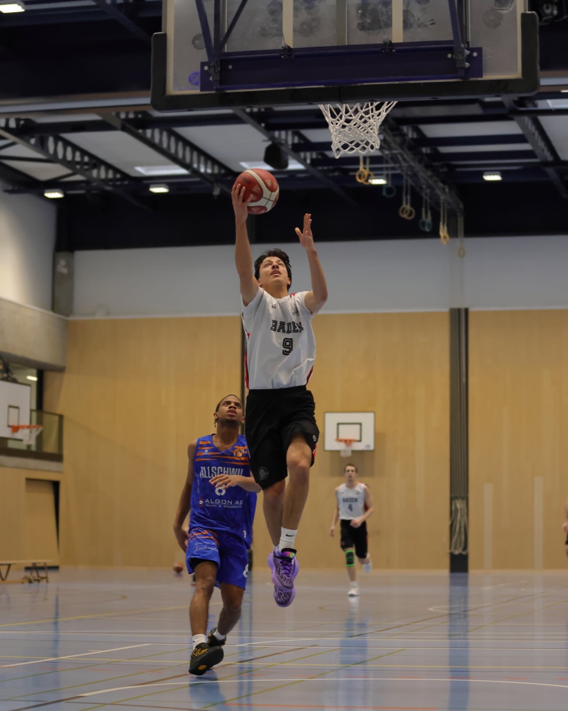 Vinicius Souza de Oliveira, #9 for BC Baden, going up for a layup
