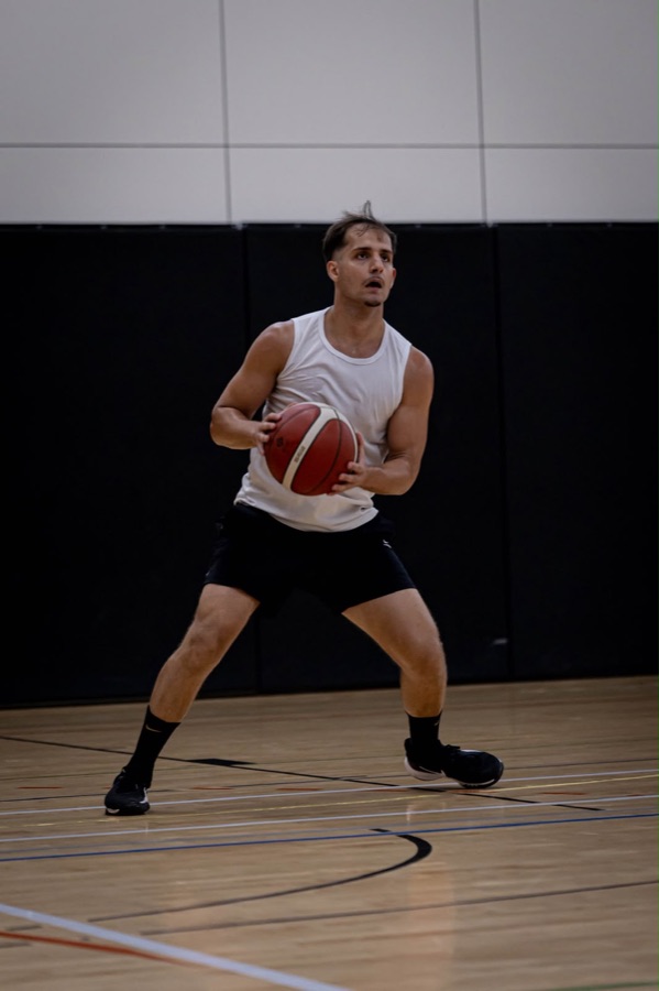 Stefan Rocchi Drobnjak with a basketball on court